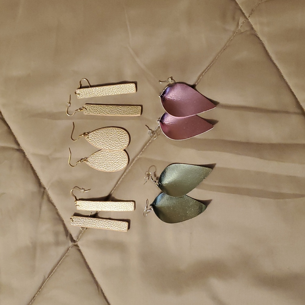 5 pair leather like earrings.